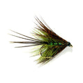 Fishing fly with green and brown feathers on a white background