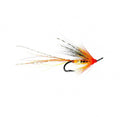 A single fly fishing lure with a black hook, bright red body, orange and yellow feathering, and black-and-white hackle wings, isolated on a solid white background.
