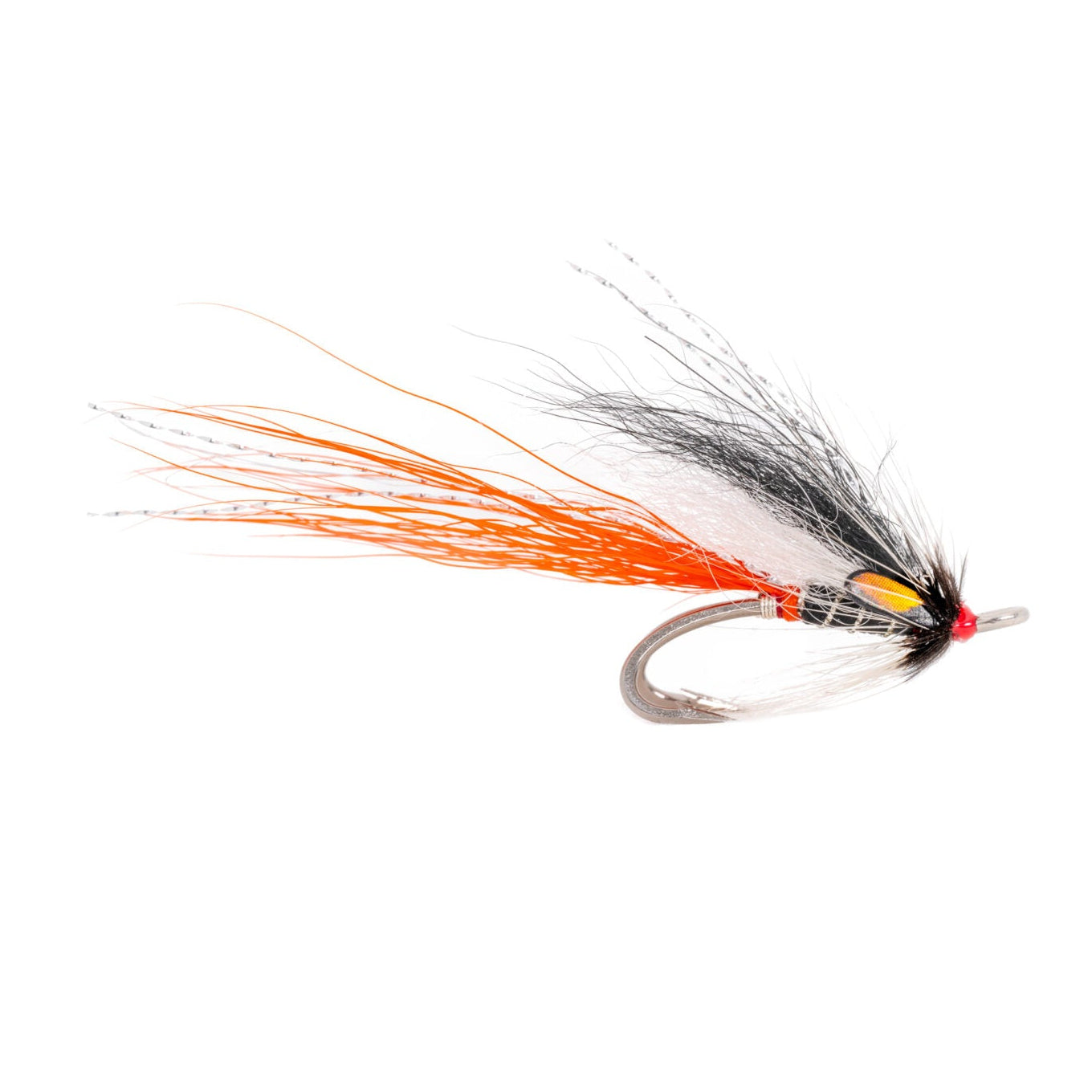 Fishing fly with orange and black feathers on a white background