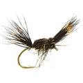 Fishing fly with brown and black feathers on a white background