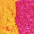 Close-up of two fluffy faux-fur textures side by side, one bright orange-yellow and one vivid magenta-pink, with a small white area visible at the bottom right.