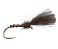 Fishing fly with brown body and black hair on a white background