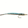 Fishing fly with blue and black pattern on a white background