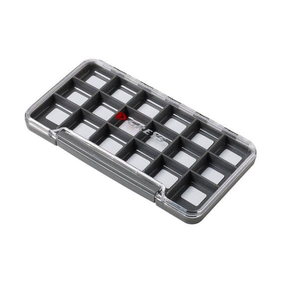 Clear plastic compartmentalized box with small items on a white background